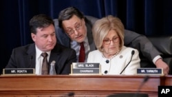 House Budget Committee Chair Diane Black, R-Tenn., (R), joined at left by Rep. Todd Rokita, R-Ind., and panel staff member Jim Bates (C), works on the Republican health care bill, on Capitol Hill in Washington, March, 16, 2017.