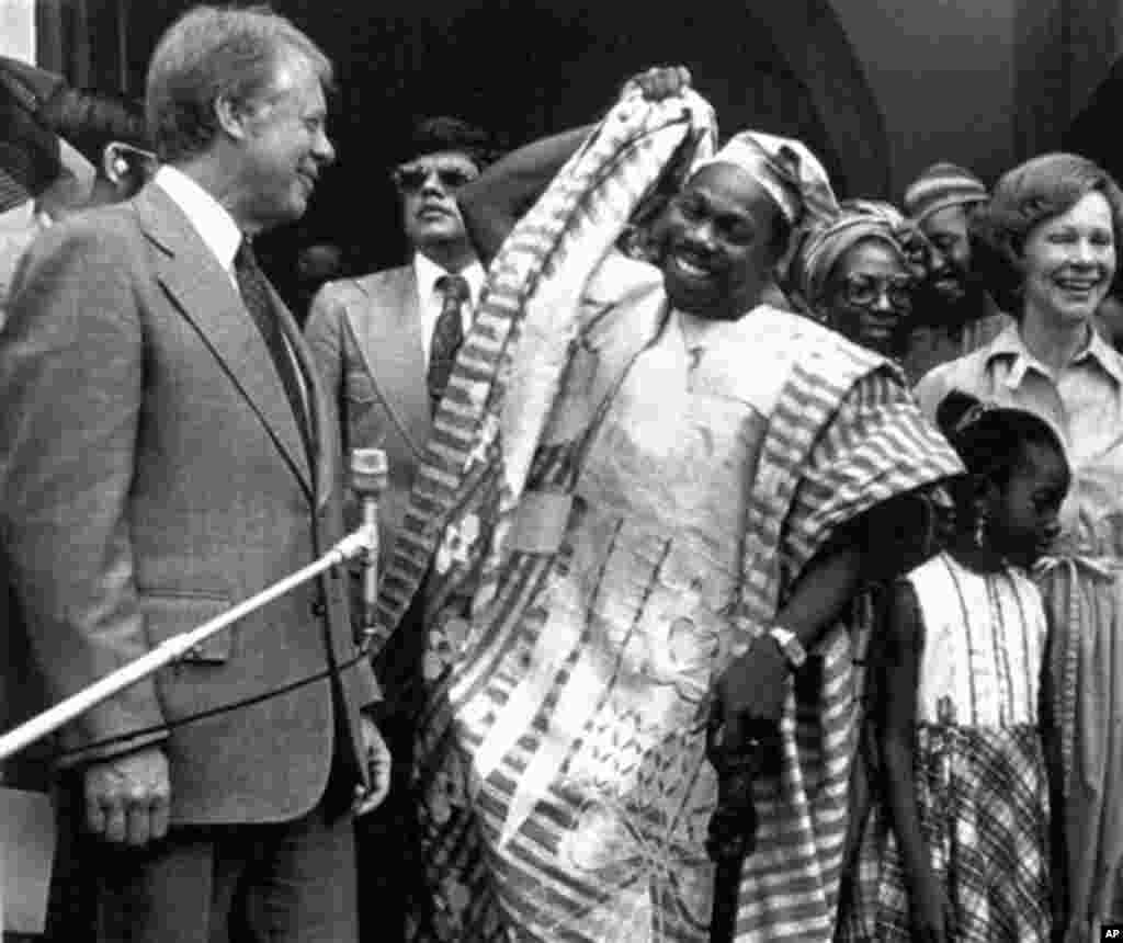 American President Jimmy Carter, left, and Nigerian Head of State General Olusegun Obasanjo after attending a service at the First Baptist Church, in Lagos on April 3, 1978.