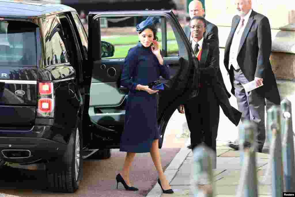 The Duchess of Sussex arrives for the wedding of Princess Eugenie to Jack Brooksbank at St George's Chapel in Windsor Castle, Windsor, Britain, Oct. 12, 2018.