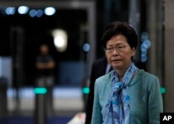 Hong Kong Chief Executive Carrie Lam listens to reporters questions during a press conference in Hong Kong, Tuesday, July 2, 2019.