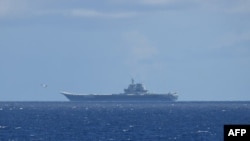 FILE - This handout photo taken on July 9, 2024 and released on July 10 by Japan's Ministry of Defense shows the Chinese navy's aircraft carrier Shandong in the Pacific Ocean southeast of Miyakojima, Okinawa prefecture.