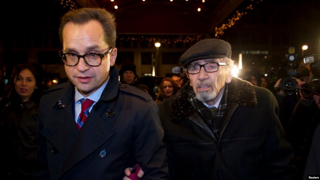 Boris Khodorkovsky (R), father of Russian former oil tycoon Mikhail Khodorkovsky, arrives to hotel Adlon in Berlin, Dec. 21, 2013. 