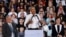 Former President Barack Obama speaks at a rally in support of candidate for Senate Rep. Jacky Rosen, D-Nev., right, and Clark County Commission Chair and Democratic gubernatorial candidate Steve Sisolak, left, in Las Vegas, Oct. 22, 2018.