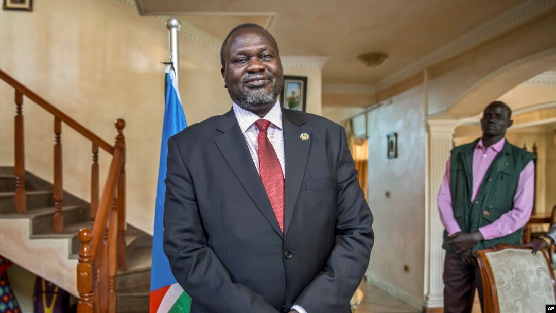 FILE - South Sudan rebel leader Riek Machar poses for a photograph as he is interviewed by The Associated Press about the situation in South Sudan.