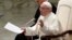 Pope Francis talks during the weekly general audience in the Paul VI Hall at the Vatican, March 7, 2018. 