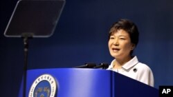 South Korean President Park Geun-hye delivers a speech during a ceremony marking the 68th anniversary of the liberation from the Japan's 1910-45 colonial rule, in Seoul, August 15, 2013.