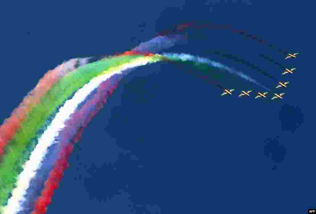 Al-Fursan, the United Arab Emirates Air Force display team, paints the sky with MB339 aircrafts during the Kuwait aviation show in Kuwait City.