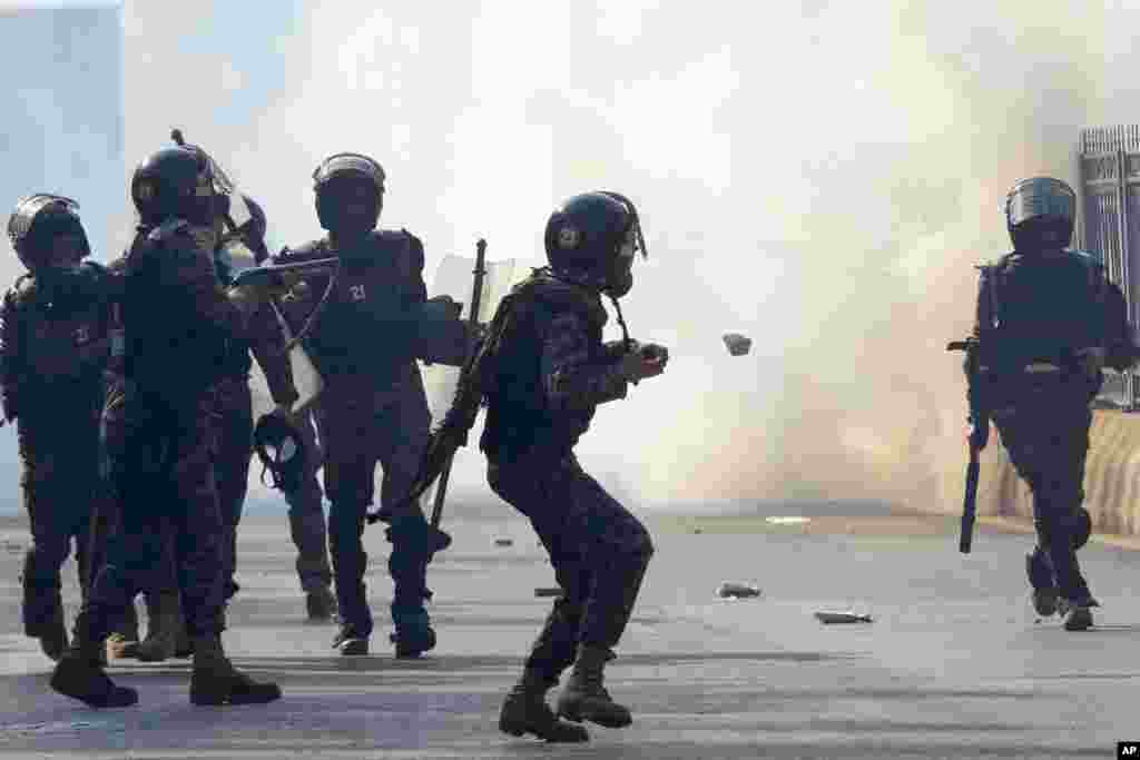 Paramilitary soldiers fire tear gas shells to disperse supporters of imprisoned former premier Imran Khan&#39;s Pakistan Tehreek-e-Insaf party, during clashes, in Islamabad, Pakistan.