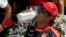 Juan Pablo Montoya, of Colombia, celebrates after winning the 99th running of the Indianapolis 500 auto race at Indianapolis Motor Speedway in Indianapolis, Sunday, May 24, 2015.
