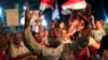  A supporter of Egypt's ousted President Mohammed Morsi chants slogans during a protest outside Rabaah al-Adawiya mosque, where protesters have installed a camp and hold daily rallies at Nasr City in Cairo, Egypt, Aug. 4, 2013.