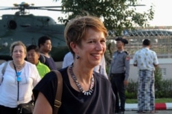 FILE - U.N. Special Envoy for Myanmar Christine Schraner Burgener arrives at Sittwe airport, in Rakhine State, Oct. 15, 2018.