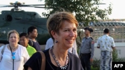 FILE - U.N. Special Envoy for Myanmar Christine Schraner Burgener arrives at Sittwe airport, in Rakhine State, Oct. 15, 2018.