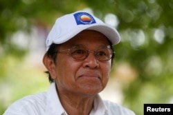 FILE - Cambodia's opposition leader and President of the National Rescue Party (CNRP) Kem Sokha talks during an interview with Reuters in Prey Veng province, May 28, 2017.