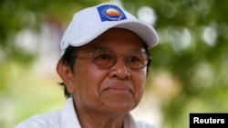 FILE - Cambodia's opposition leader and President of the National Rescue Party (CNRP) Kem Sokha talks during an interview with Reuters in Prey Veng province, Cambodia May 28, 2017. 