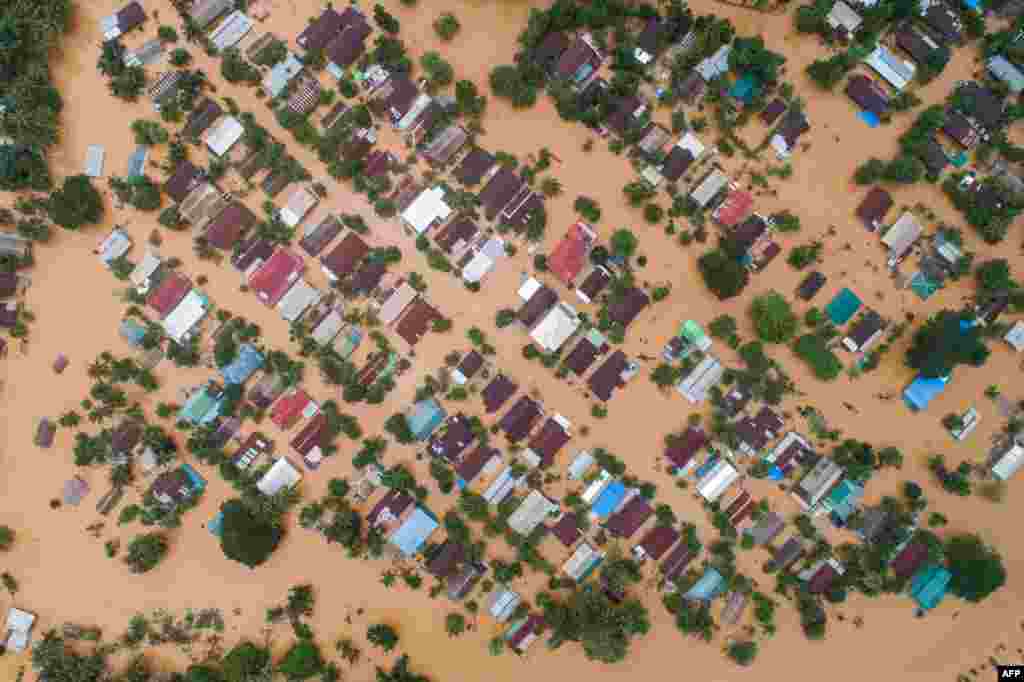 This aerial photo shows floodwaters submerged areas of Ye township in Mon State, Myanmar. Troops deployed to flood-hit parts of the country to help with relief efforts after rising waters left thousands stranded.