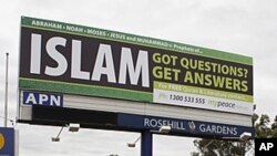 A billboard offering information about Islam is seen on a main road in west Sydney. The billboards, paid by an Islamic group called MyPeace, offer free information about Islam, a free copy of the Koran and other Islamic literature, (File photo June 10, 20