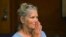 Leslie Van Houten reacts after hearing she is eligible for parole during a hearing on Sept. 6, 2017 at the California Institution for Women in Corona, Calif. 
