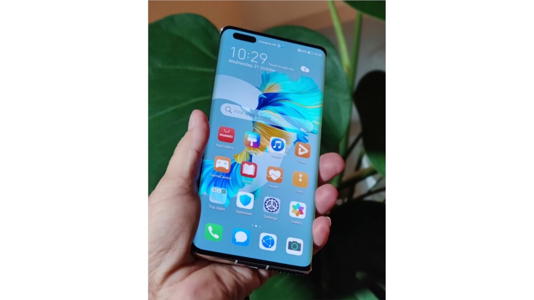 The new Huawei Mate 40 Pro smartphone is held for a photo, in London, Wednesday Oct. 21, 2020. Huawei, has unveiled its Mate 40 line of phones, Thursday Oct. 22, 2020, a product release that comes at a crucial moment for the company. (AP Photo/James…