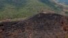 FILE - Burnt land is pictured after fires near Banjarmasin in South Kalimantan province, Indonesia, Sept. 29, 2019. 