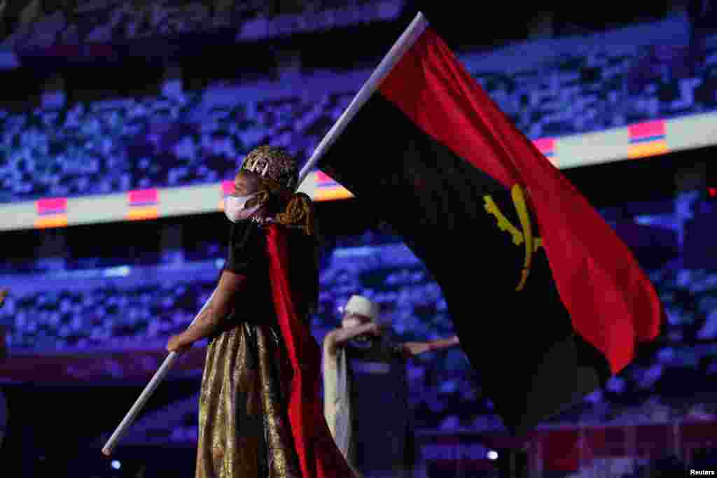 The Tokyo 2020 Olympics Opening Ceremony - Olympic Stadium, Tokyo, Japan - July 23, 2021. Flag bearer Natalia Santos of Angola during the opening ceremony leads her contingent during the athletes&#39; parade at the opening ceremony REUTERS/Hannah Mckay