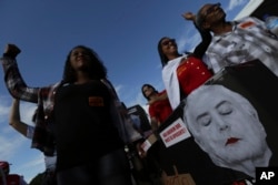 Demonstrators take part in a mock funeral for Brazil's President Michel Temer, during an anti-government protest in Brasilia, May 24, 2017.