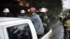 ARCHIVO - Mineros viajan en la parte trasera de una camioneta después de ayudar en los esfuerzos de rescate tras explosión en una mina de carbón en Sutatausa, departamento de Cundinamarca, Colombia, el miércoles 15 de marzo de 2023.