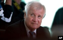 German Interior Minister Horst Seehofer attends the weekly cabinet meeting at the Chancellery in Berlin, Germany, Aug. 29, 2018.