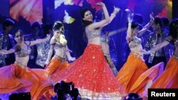 FILE - Bollywood actress Deepika Padukone performs during the 15th International Indian Film Academy Awards in Tampa, Florida, April 26, 2014. 