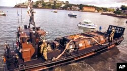 British marines are making use of Sierra Leone's extensive network of rivers to provide resources and personnel critical to the Ebola response, Nov. 7, 2014.