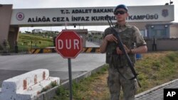 A Turkish soldier guards the entrance to the prison complex in Aliaga, Izmir province, western Turkey, where jailed U.S. pastor Andrew Craig Brunson is appearing on his trial at a court inside the complex, May 7, 2018. 