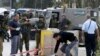 نیروهای اسرائیلی در حال بازرسی صحنه حمله یک فلسطینی به سربازان با تبر در اردوگاه پناهندگان عروب 