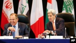 U.S. Secretary of State John Kerry, right, and Russian Foreign Minister Sergey Lavrov, left, attend the International Syria Support Group (ISSG) meeting in Munich, Germany, Thursday Feb. 11, 2016, together with members of the Syrian opposition and other officials. (Michael Dalder/Pool Photo via AP)