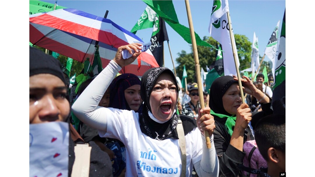 Suda Hemsanga, a Krabi resident, yells in protest against a proposed coal-fired plant on Thailand's coast, in Bangkok, Thailand, Feb. 17, 2017.