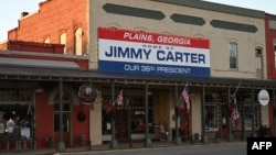 A sign in honor of former U.S. President Jimmy Carter hangs in Plains, Georgia, on Dec. 30, 2024.