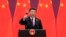 Le président chinois Xi Jinping lève son verre et propose un toast lors d'une cérémonie au Grand Hall du Peuple à Pékin, le 26 avril 2019. 
