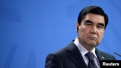 FILE - President of Turkmenistan Gurbanguly Berdimuhamedow attends a news conference at the Chancellery in Berlin, Germany, Aug. 29, 2016. 