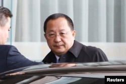 North Korean Foreign Minister Ri Yong Ho leaves Capital International Airport in Beijing, China, after returning from talks in Sweden, March 19, 2018.