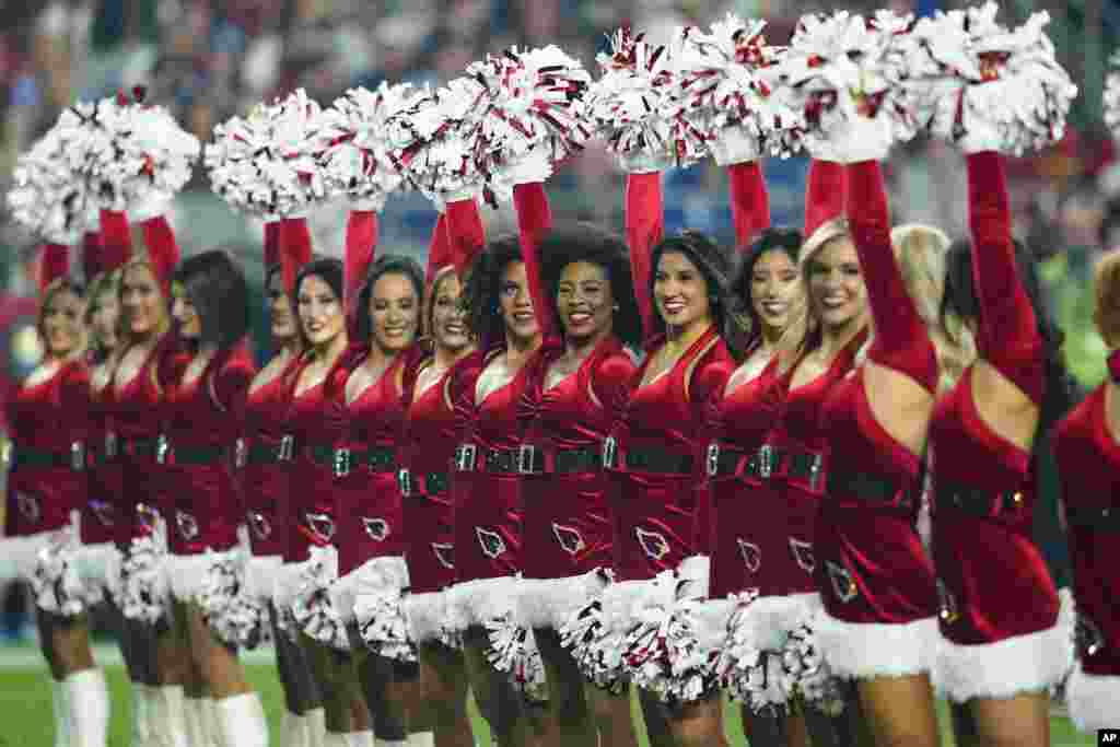 The Arizona Cardinals cheerleaders perform during the second half of an NFL football game against the Indianapolis Colts, Dec. 25, 2021, in Glendale, Arizona.