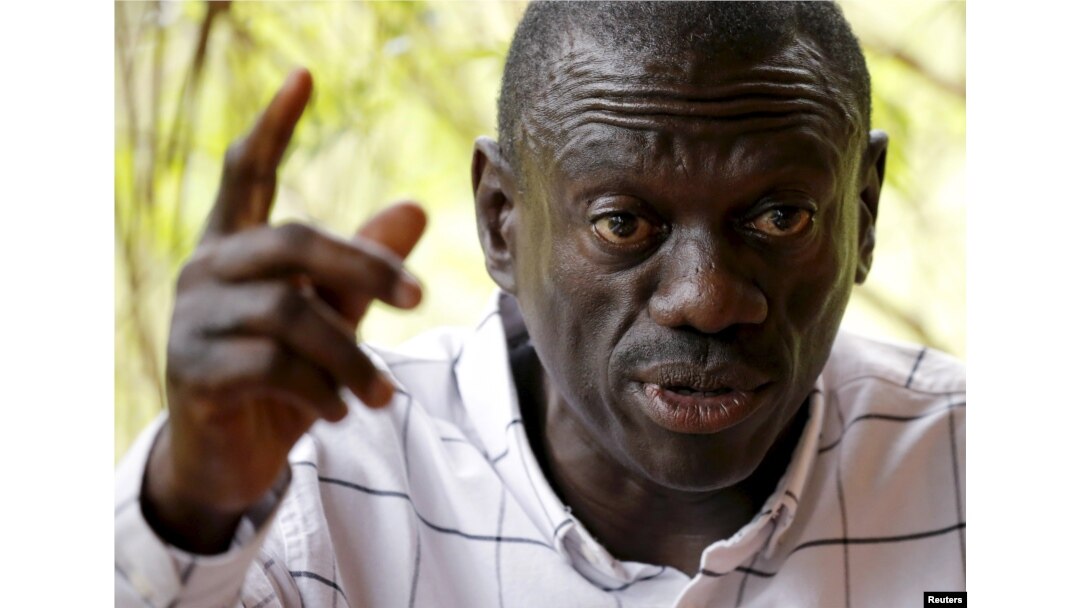 FILE - Opposition leader Kizza Besigye speaks during a news conference at his home at the outskirts of Kampala, Uganda, Feb. 21, 2016.