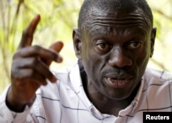 FILE - Opposition leader Kizza Besigye speaks during a news conference at his home at the outskirts of Kampala, Uganda, Feb. 21, 2016.