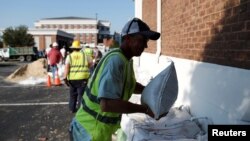   Cities and towns throughout the state filled thousands of sandpits, evolved evacuation plans and organized rescue teams. 