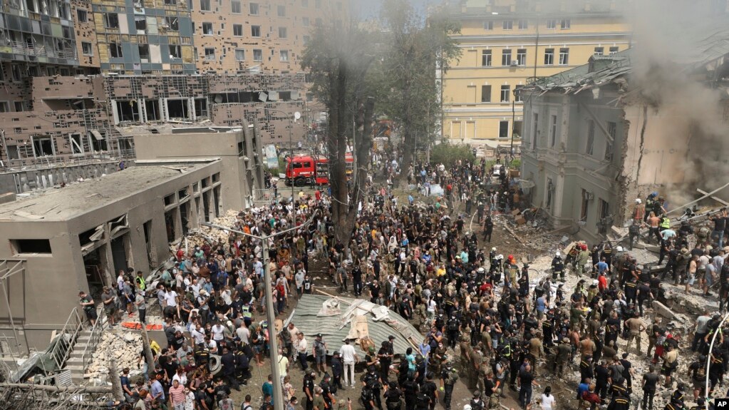 Rescuers and volunteers clean up the rubble and search for victims after a Russian missile hit the country's main children's hospital, Okhmadit in Kyiv, Ukraine, July 8, 2024. 