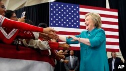 Democratic presidential candidate Hillary Clinton arrives at a rally at Hueneme High School, June 4, 2016, in Oxnard, California. Clinton is expected to clinch the Democratic presidential nomination Tuesday.