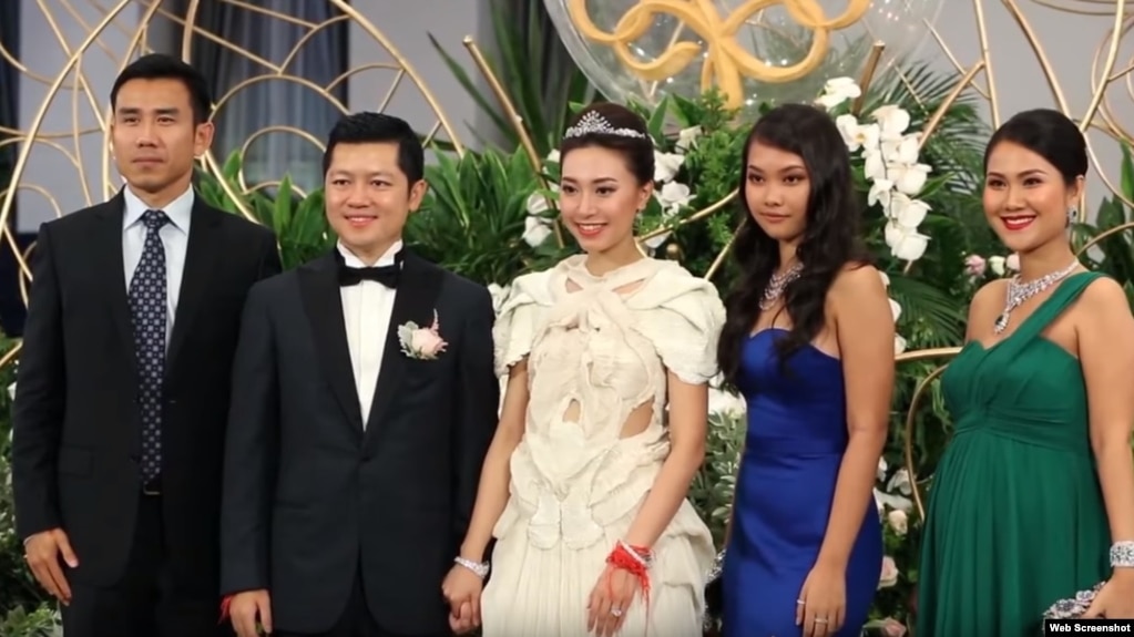 The elite guests attended the wedding of Sok Sokan, the son of the late Council of Ministers President Sok An, and Sam Ang Leakhena whose parents own Vattanac Capital, in June. (Web Screenshot)