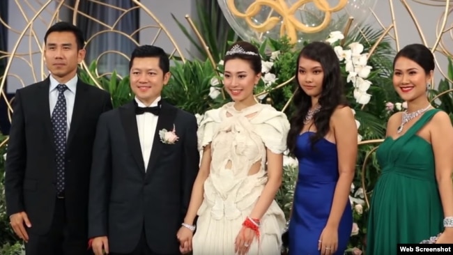 The elite guests attended the wedding of Sok Sokan, the son of the late Council of Ministers President Sok An, and Sam Ang Leakhena whose parents own Vattanac Capital, in June. (Web Screenshot)