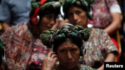 FILE - Indigenous women from the Ixil region attend a genocide trial in Guatemala City, May 9, 2013, for former Guatemalan president Efrain Rios Montt, who was accused of overseeing the killings of nearly 2,000 members of the Maya Ixil population during the country’s civil war.