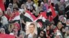 Syrian Protesters Wait for President's Address