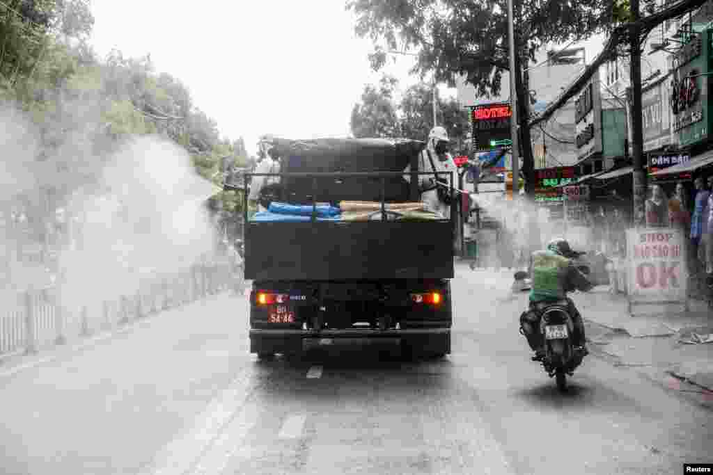 A truck sprays disinfectant amid the COVID-19 outbreak in Ho Chi Minh city, Vietnam, June 1, 2021.