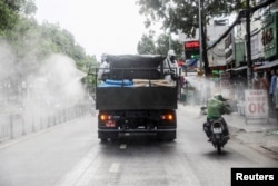 Xe chuyên dụng phun thuốc khử trùng ở thành phố Hồ Chí Minh hôm 1/6/2021, Vietnam June 1, 2021.