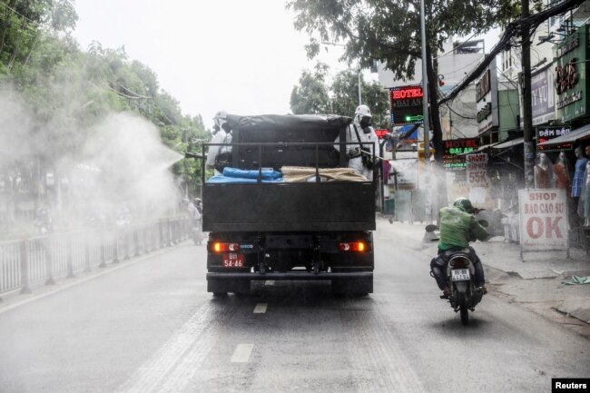 Xe chuyên dụng phun thuốc khử trùng ở thành phố Hồ Chí Minh hôm 1/6/2021, Vietnam June 1, 2021.